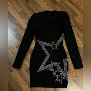Black long sleeve dress with silver embroidered stars